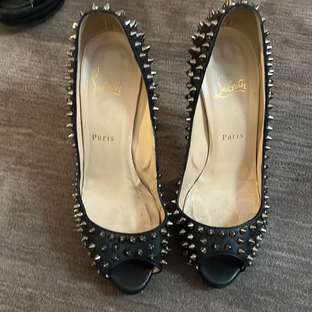 Christian Louboutin classic spike peep toe black leather pumps size 38.5